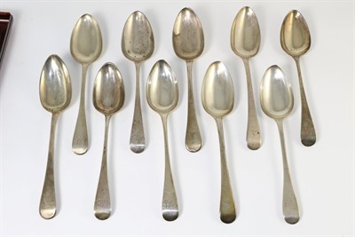 Lot 304 - A group of ten George III silver old English pattern table spoons, various dates and makers...