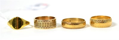 Lot 323 - An 18 carat gold signet ring, finger size P; a 9 carat gold broad band ring, with lattice...