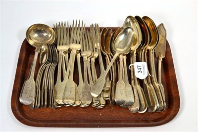 Lot 347 - A part composite service of mostly William IV silver fiddle pattern flatware, mostly William Eaton