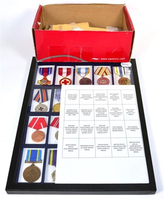 Lot 357 - A collection of medals, mainly replicas including miniatures and a collection of twenty...