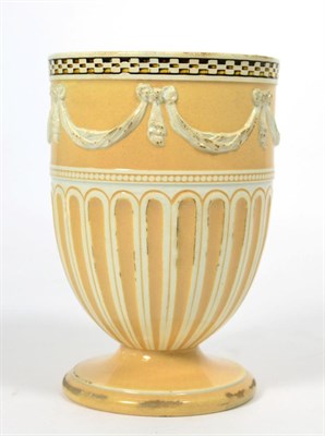 Lot 371 - A Wedgwood creamware urn shaped vase, late 18th century, moulded with drapery swags within...