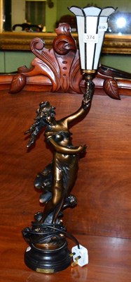 Lot 374 - After Louis Moreau, a spelter figural table lamp