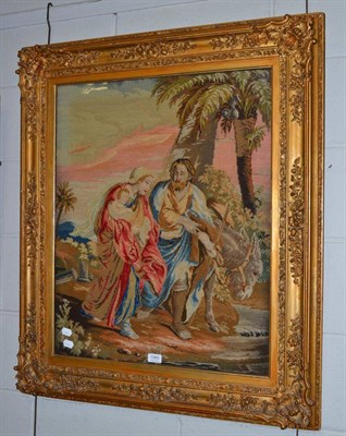 Lot 1060 - A Victorian needlework, depicting Mary, Joseph and Jesus