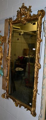 Lot 1088 - A gold painted rectangular wall mirror