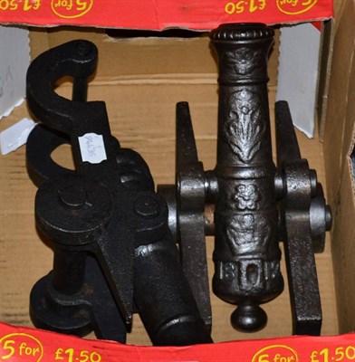 Lot 1124 - A brace of cast iron models of signal cannon, each with 23cm barrel cast with foliate rosettes...