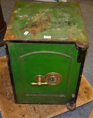 Lot 1145 - A cast iron safe and key