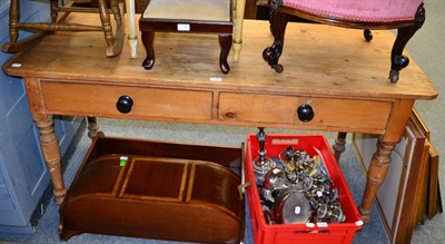 Lot 1151 - A pine two drawer table