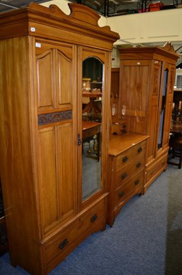 Lot 1171 - A pine mirror fronted wardrobe and matching dressing table together with a further wardrobe (3)