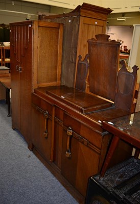 Lot 1175 - A 1920s camphor wood lined oak wardrobe and a 1920s oak Beautility canteen/sideboard with fully...