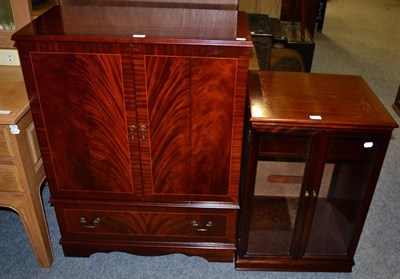 Lot 1183 - A stereo unit and a TV cabinet