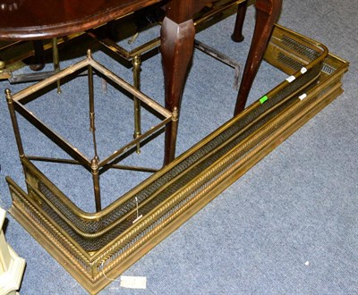 Lot 1191 - Two pierced brass fender (2)