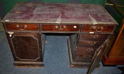 Lot 1205 - A George III mahogany pedestal desk (a.f.)