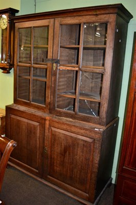 Lot 1206 - A 19th century oak livery cabinet