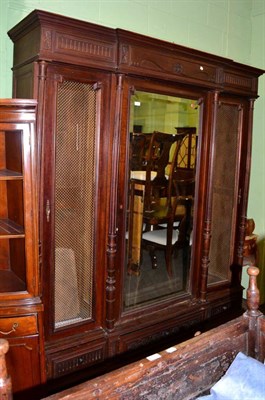 Lot 1209 - A French mirrored door armoire