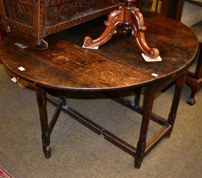 Lot 1211 - An 18th century and later oak gateleg table