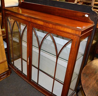 Lot 1214 - A mahogany display cabinet on ball and claw feet