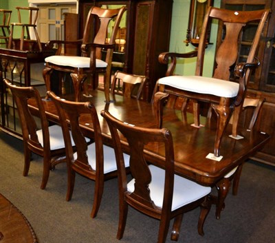 Lot 1215 - A reproduction mahogany extending dining table in the William IV style together with a matching set