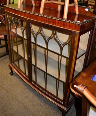 Lot 1216 - A mahogany display cabinet on ball and claw feet