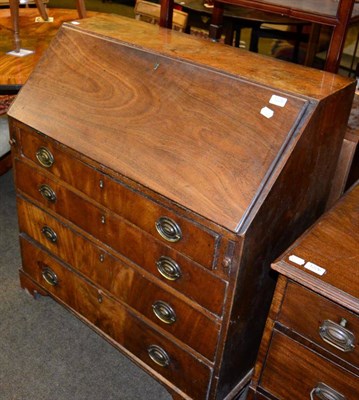 Lot 1225 - A George III mahogany bureau