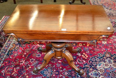 Lot 1268 - A 19th century mahogany fold over tea table