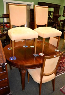 Lot 1277 - A reproduction extending dining table together with five dining chairs