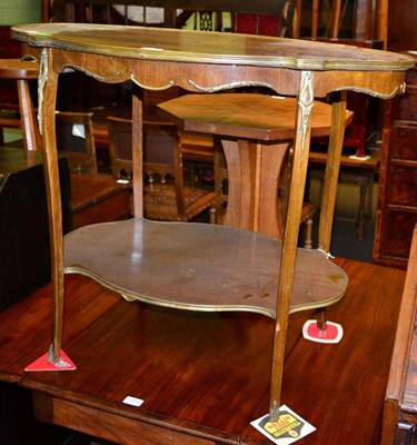 Lot 1280 - A French style gilt metal mounted two tier occasional table