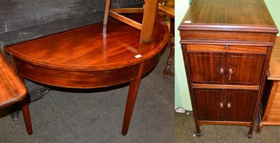 Lot 1298 - A mahogany demi-lune table together with a converted drinks cabinet