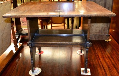 Lot 1299 - A 20th century foldover oak occasional table