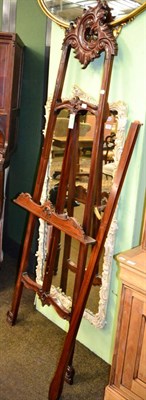 Lot 1310 - A carved mahogany easel