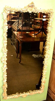 Lot 1311 - A painted scroll frame rectangular wall mirror