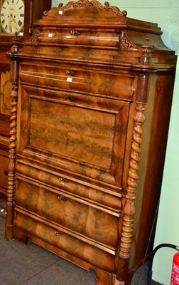 Lot 1314 - A mahogany secretaire a abbatant, the fall front opening to reveal an arrangement of drawers...