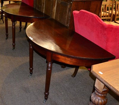 Lot 1320 - A pair of George III mahogany D end tables