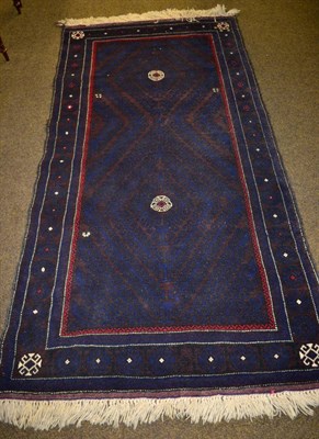 Lot 1332 - Balouch Rug, Persian/Afghan Frontier, the walnut field of hooped diamonds enclosed by latch...