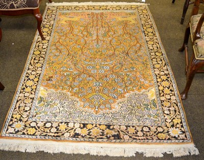 Lot 1334 - Kashmir silk prayer rug, the corn field with Tree of Life design beneath the Mihrab enclosed by...