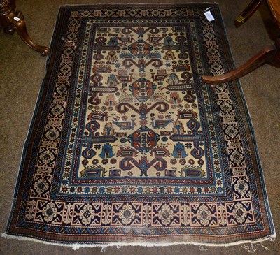 Lot 1338 - Perepedil rug, the ivory field of ";ram's horn"; motifs enclosed by Kufic borders, 158cm by 110cm