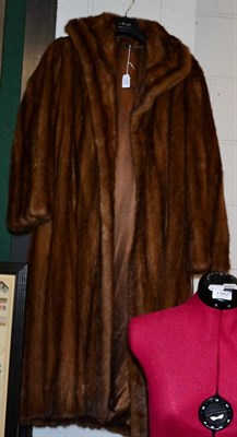 Lot 1383 - Bradleys brown mink three quarter length coat with shawl collar