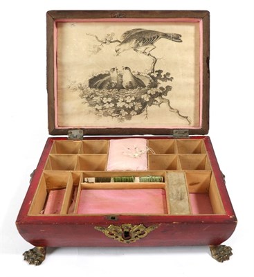 Lot 1432 - Regency red morroco mounted sewing box of sarcophagus form, mounted with brass lion heads with...