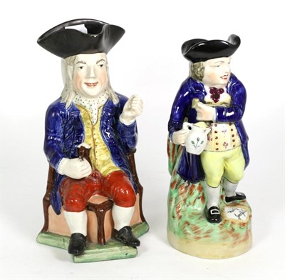 Lot 24 - A 19th century china Toby jug, The Squire and another Hearty Goodfellow (2)