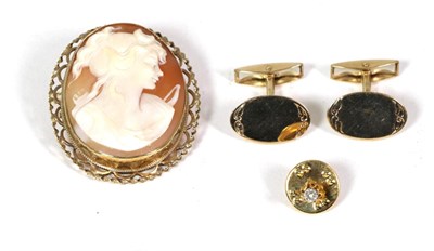 Lot 51 - A pair of 9 carat gold oval cufflinks, foliate engraved edges with hinged backs, an illusion...