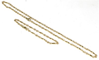 Lot 55 - A 9 carat gold fancy link necklace and bracelet suite, of alternating oval and curb links, necklace
