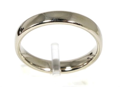 Lot 68 - An 18 carat white gold band ring, finger size R