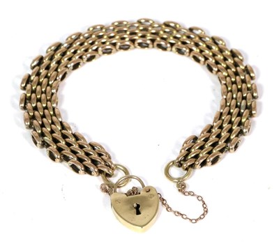 Lot 70 - A brick link bracelet, with a 9 carat gold padlock claps, length 19cm