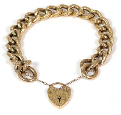 Lot 78 - A foliate chased curb link gold bracelet, with a conforming padlock clasp, length 19cm, stamped...