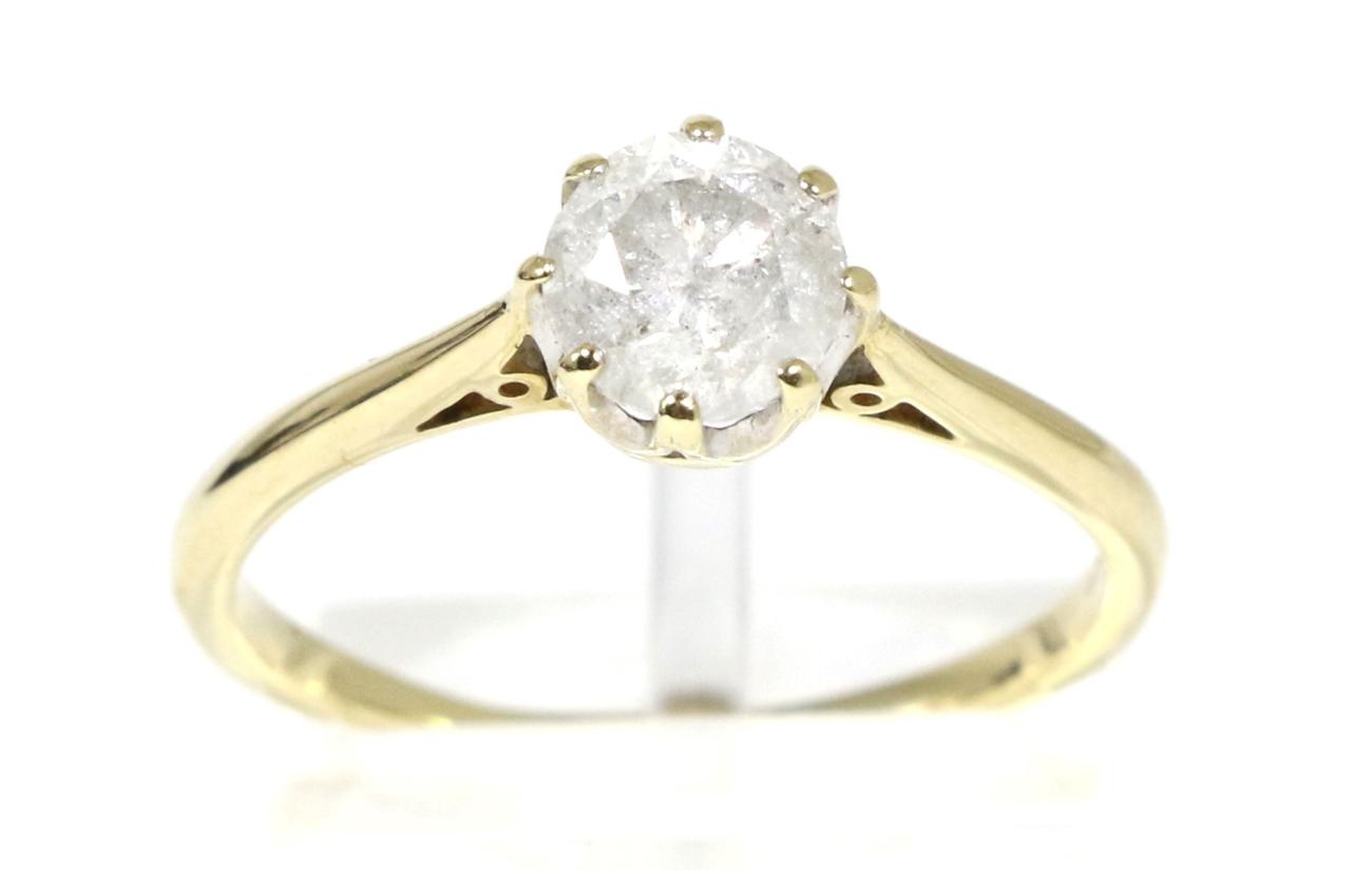 Lot 88 - A 9 carat gold solitaire diamond ring, a round brilliant cut diamond in a claw setting, to...