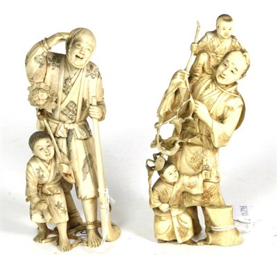Lot 151 - A Japanese ivory okimono, Meiji period, rifleman; and another, man with children