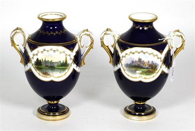 Lot 152 - A pair of Mintons porcelain twin-handled vases, circa 1900, of ovoid form with flared necks,...