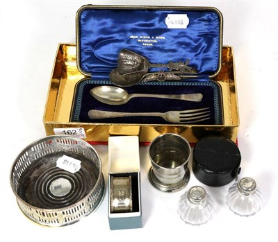 Lot 162 - A cased silver Christening set, silver napkin ring, RAF brooch, Continental sugar spoon etc