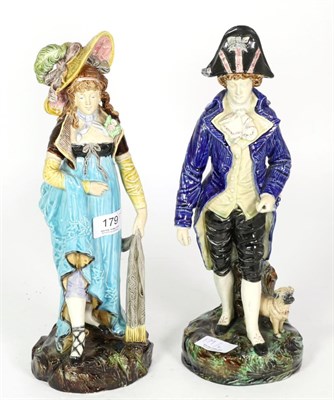 Lot 179 - A pair of French tin glazed earthenware figures