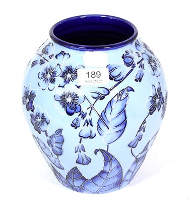 Lot 189 - A modern Moorcroft pottery Florian Echo Blue-on-blue pattern vase, designed by Carole Lovett,...