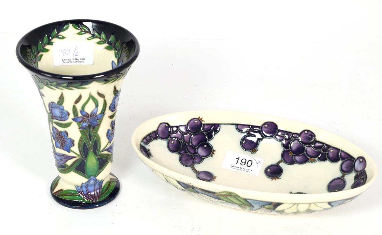 Lot 190 - A modern Moorcroft pottery Kaffir Lily pattern 86/6 vase, designed by Shirley Hayes, two star...